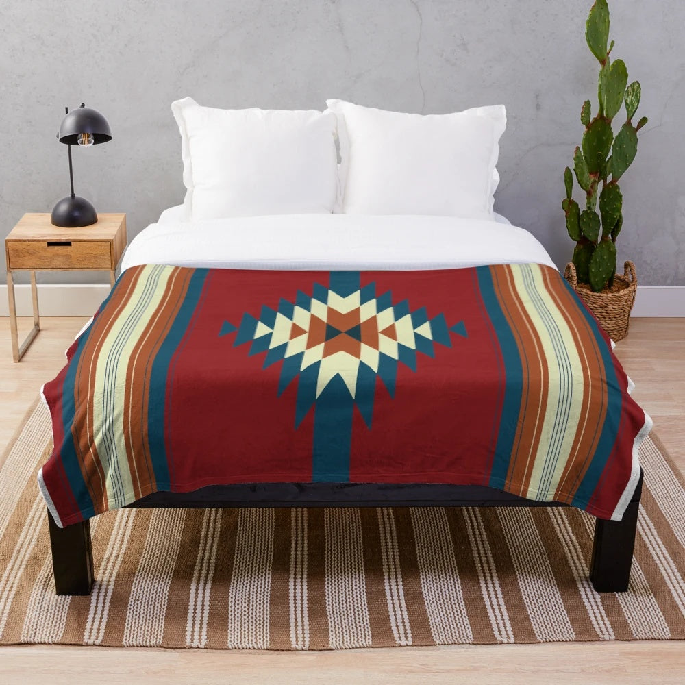 Southwestern-inspired red plush blanket with minimalist lines and tribal patterns