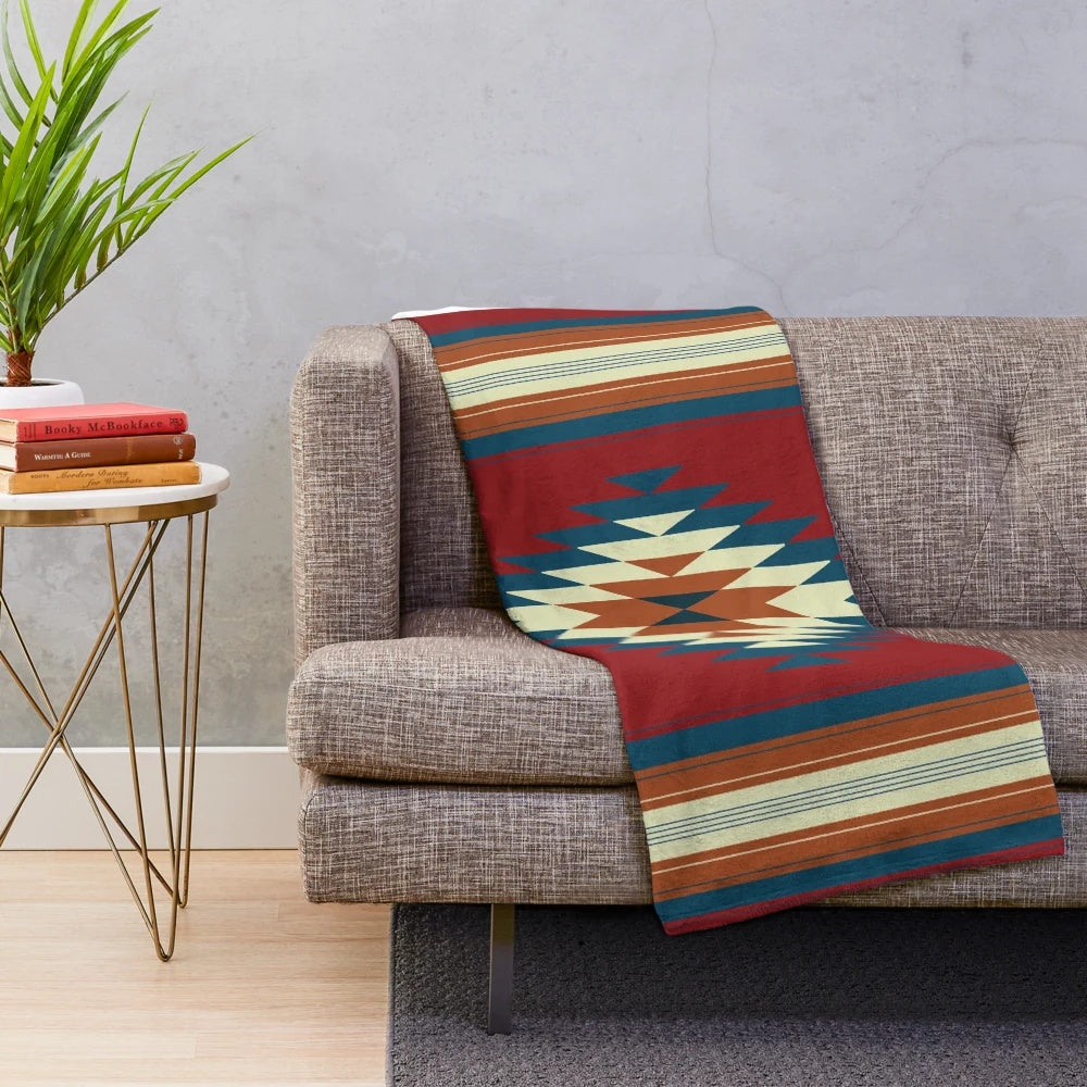 Southwestern-inspired red plush blanket with minimalist lines and tribal patterns