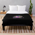 A plush and cozy space-themed blanket with a galaxy print design.