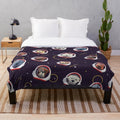 Cute plush blanket featuring space dogs in astronaut suits