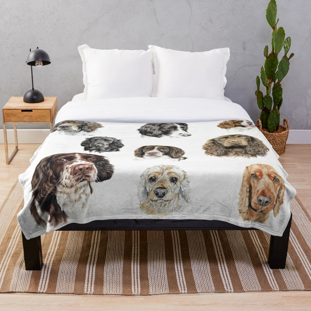 Soft and cuddly plush spaniel blanket featuring a collage of adorable dog images