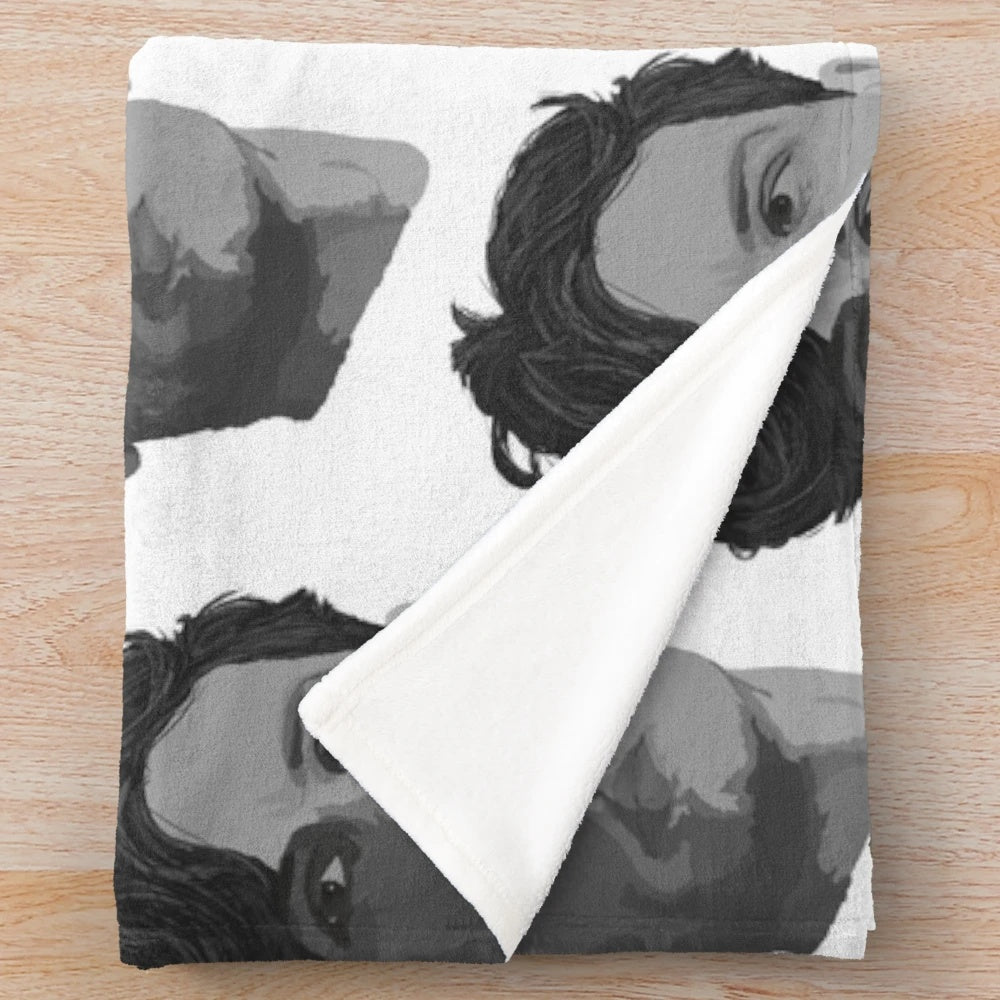 Spencer Reid from the TV show Criminal Minds depicted on a plush blanket