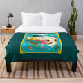 Spiritfarer inspired plush blanket featuring floral design