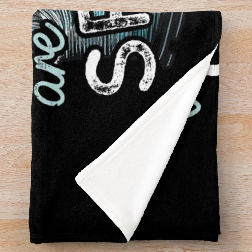 Spoiler-proof plush blanket for cinema enthusiasts