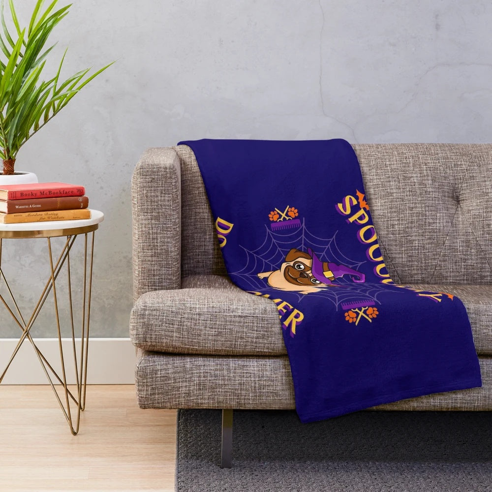 Spooky dog groomer plush blanket with paw prints and pumpkins