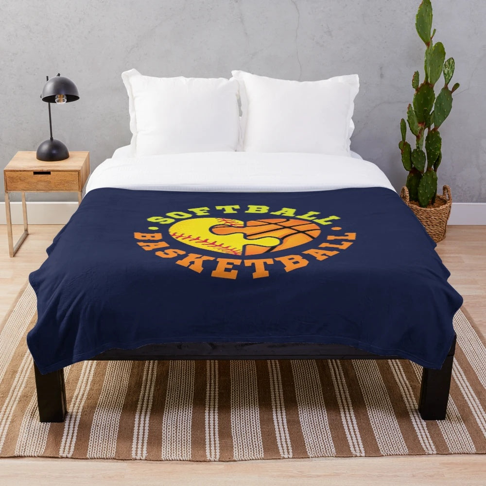 Soft plush blanket featuring a sports team design for softball and basketball fans