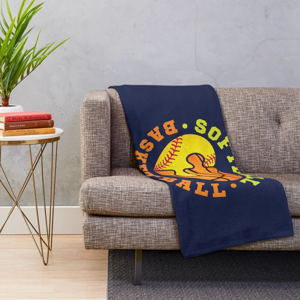 Soft plush blanket featuring a sports team design for softball and basketball fans