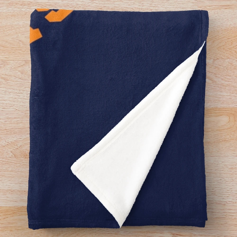 Soft plush blanket featuring a sports team design for softball and basketball fans