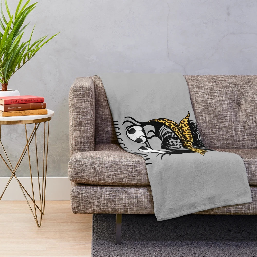 Cozy plush blanket featuring a sports mom with a messy bun and leopard print design