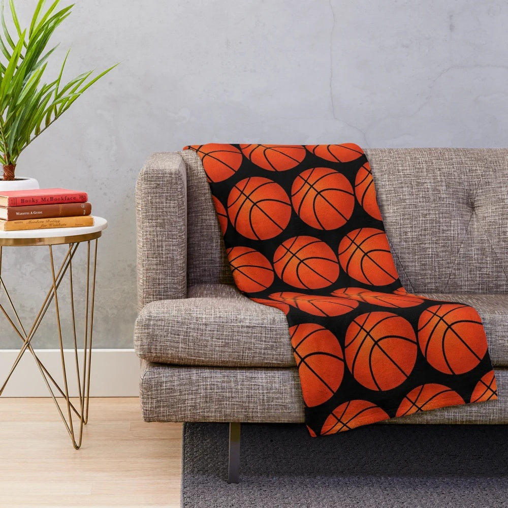 Basketball-themed plush blanket with orange and black pattern