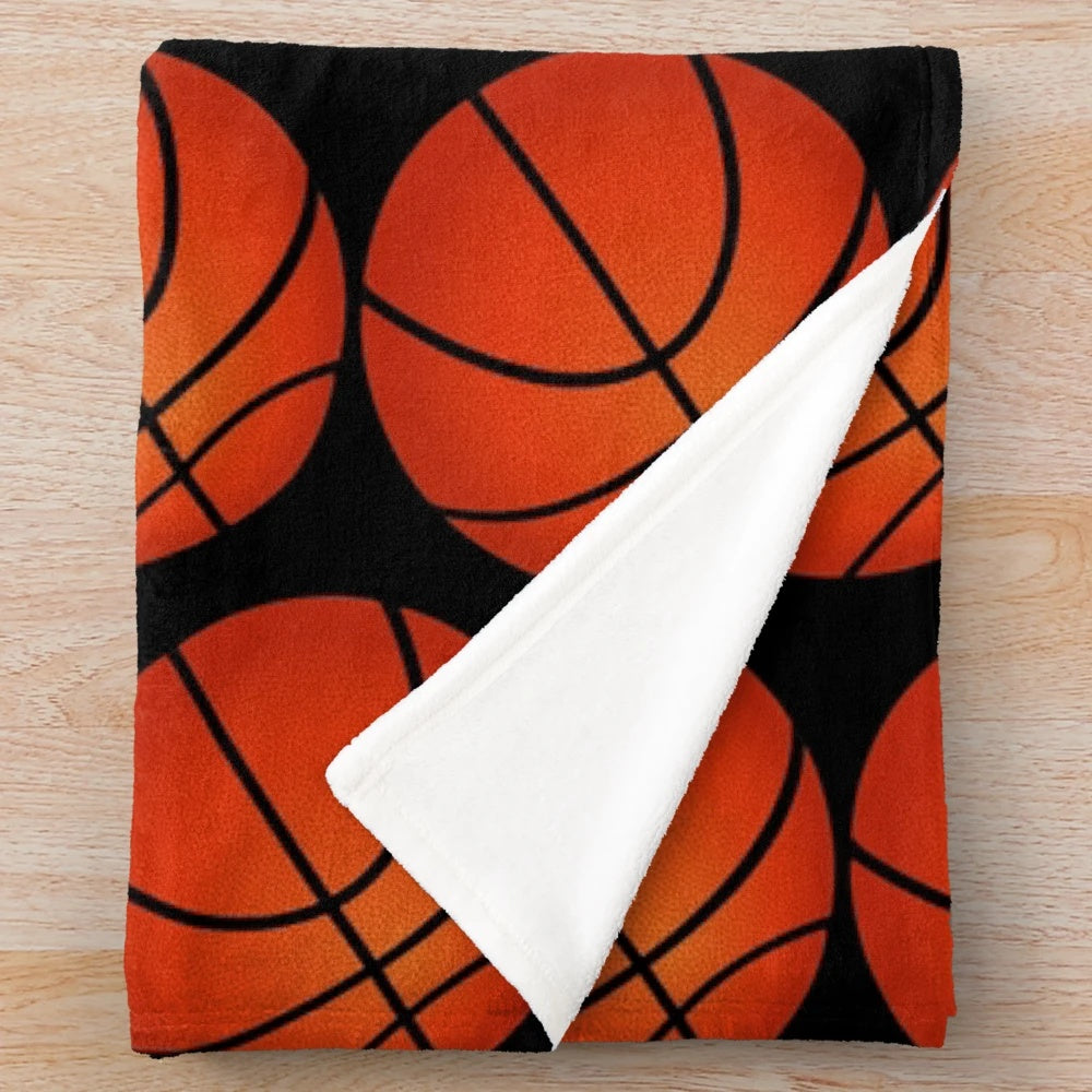 Basketball-themed plush blanket with orange and black pattern