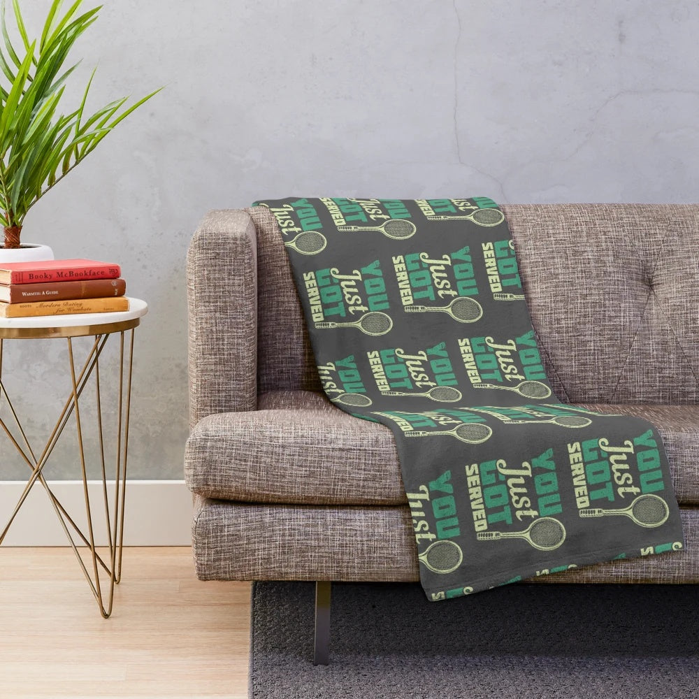 Plush blanket with a sports themed "You Just Got Served" design