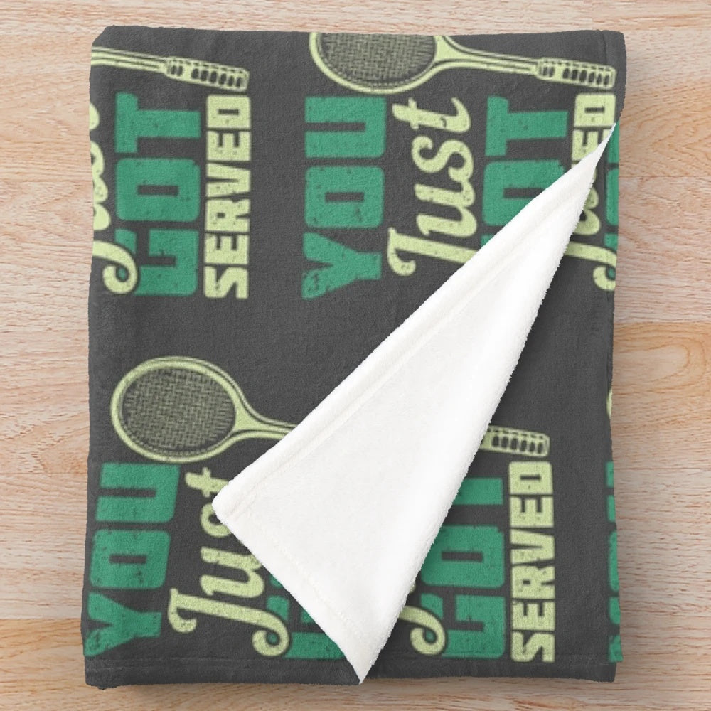 Plush blanket with a sports themed "You Just Got Served" design