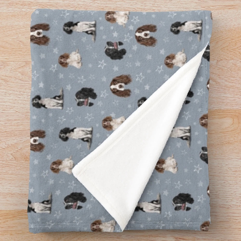 Soft and cuddly blue plush blanket featuring a Springer Spaniel dog breed design
