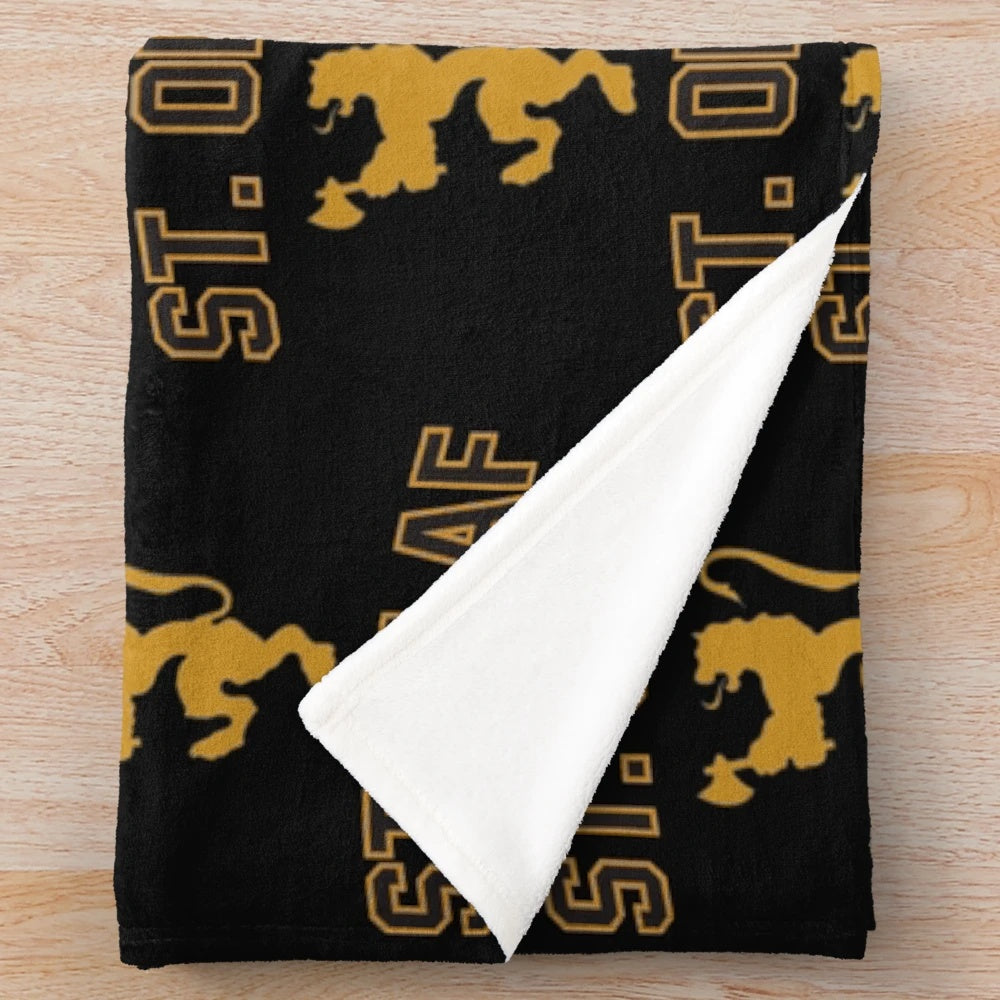 St. Olaf Plush Blanket featuring the college's logo and located in Northfield, Minnesota