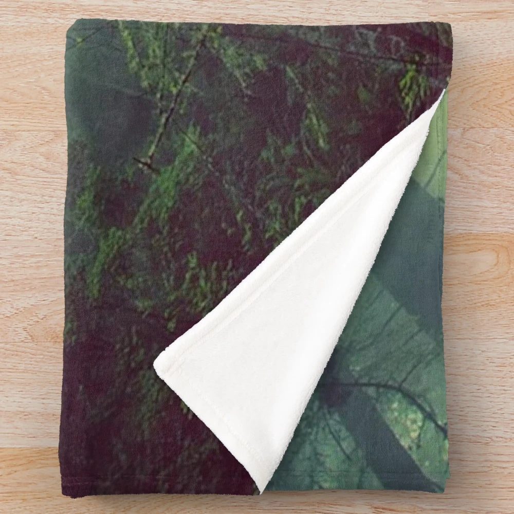 Soft, plush stadium-inspired blanket with abstract design