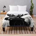 Stag plush blanket with a nature-inspired, mythical design