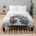Soft and cuddly plush blanket featuring a portrait of a standard poodle in parti color