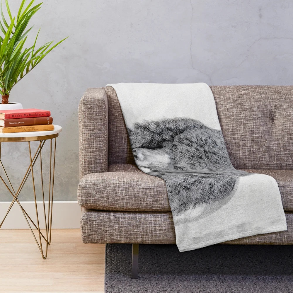 Soft and cuddly plush blanket featuring a portrait of a standard poodle in parti color