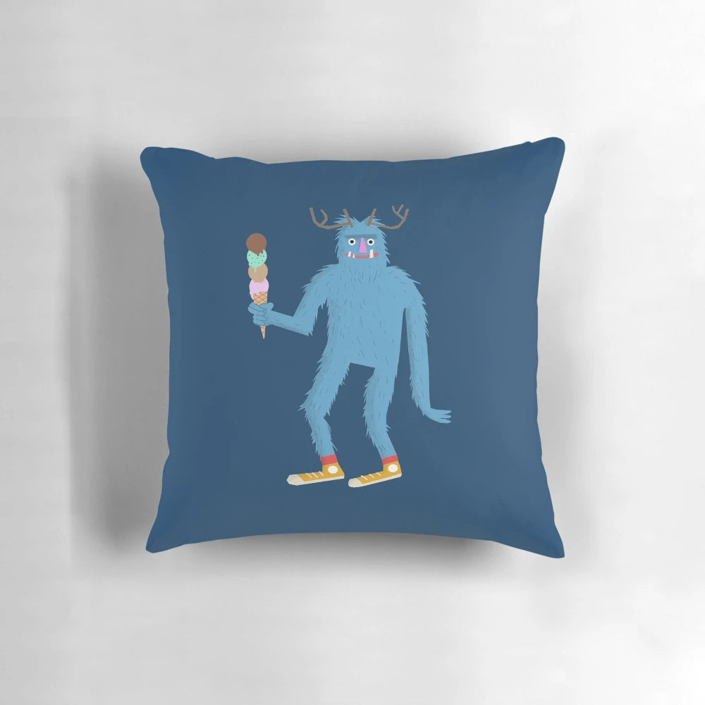 Soft, plush pillow in the shape of a fantastical creature with furry features and antlers