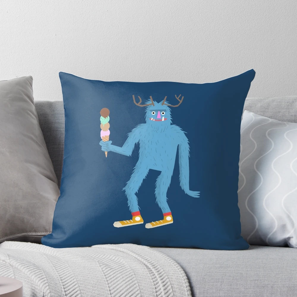 Soft, plush pillow in the shape of a fantastical creature with furry features and antlers