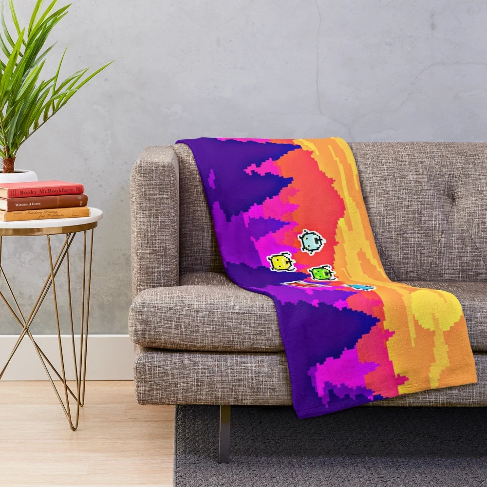 Stardew Valley inspired plush blanket featuring 8-bit style junimos