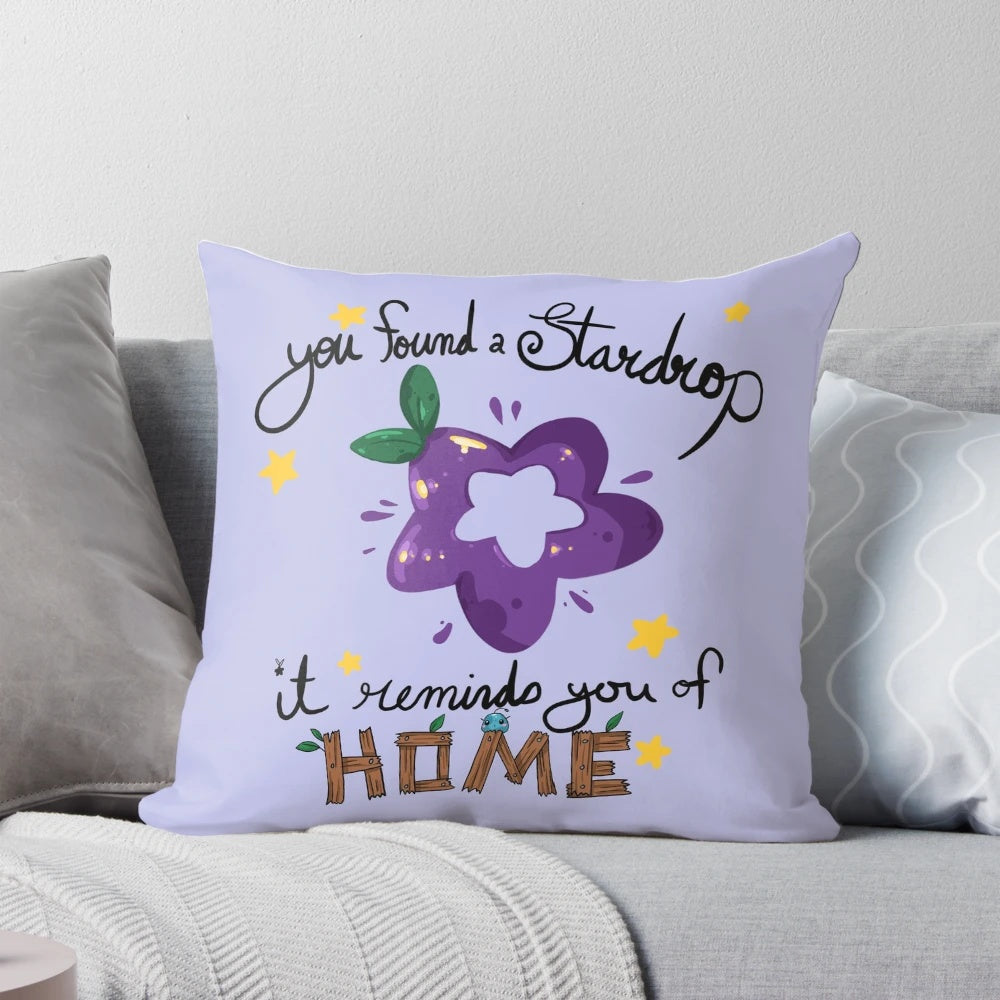 A soft, plush pillow featuring the iconic "StarDrop" from the video game Stardew Valley.