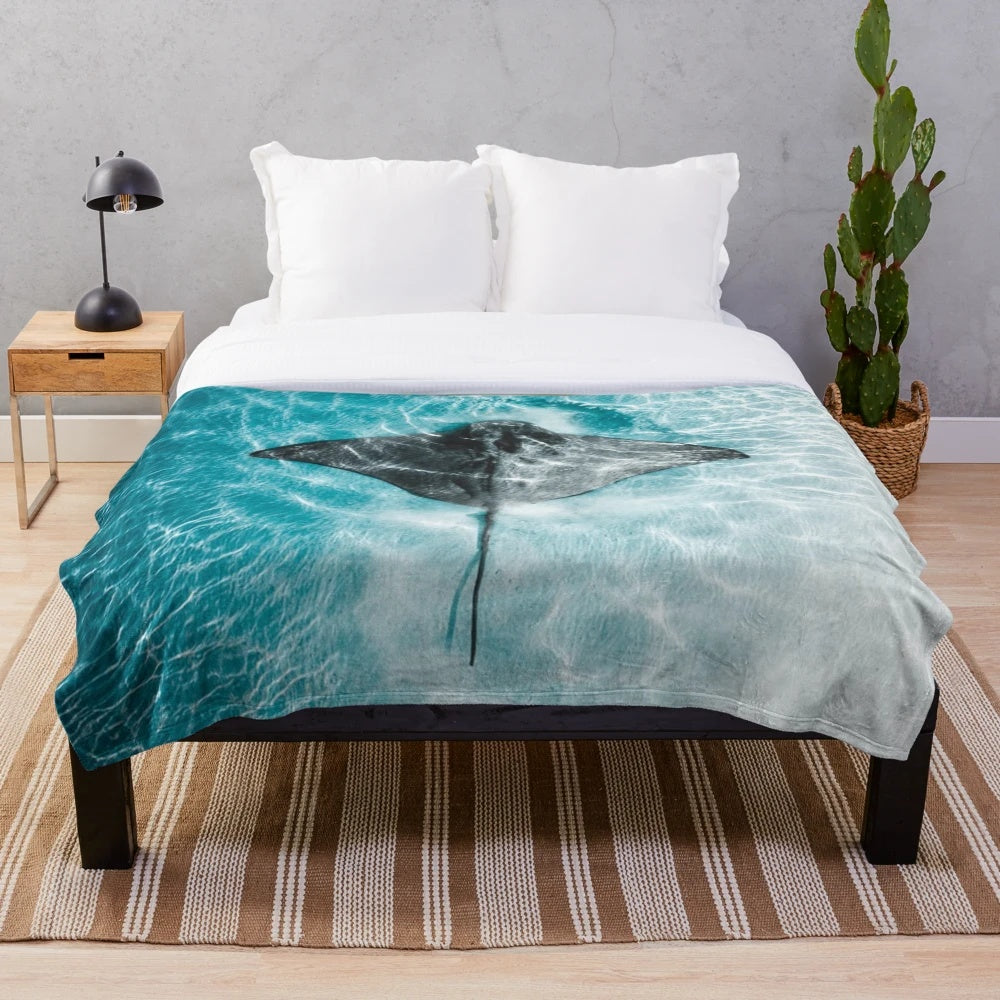 Soft and plush stingray swimming in a serene ocean scene