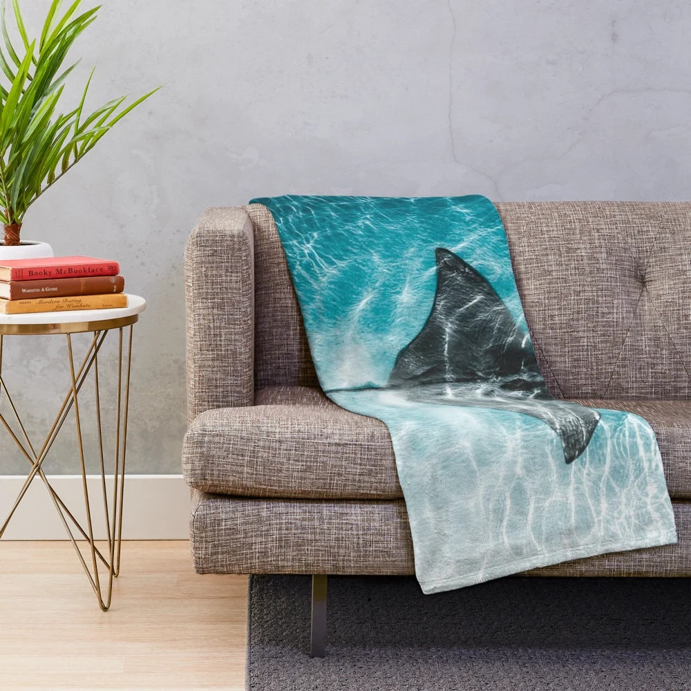 Soft and plush stingray swimming in a serene ocean scene