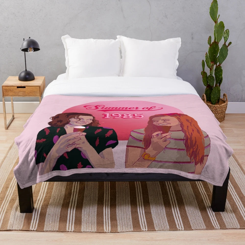 Stranger Things inspired plush blanket featuring characters Eleven and Max