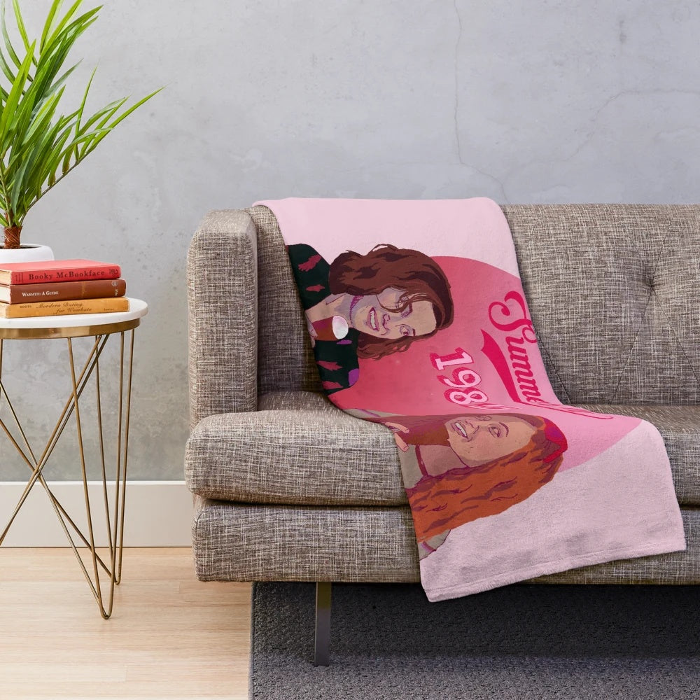 Stranger Things inspired plush blanket featuring characters Eleven and Max