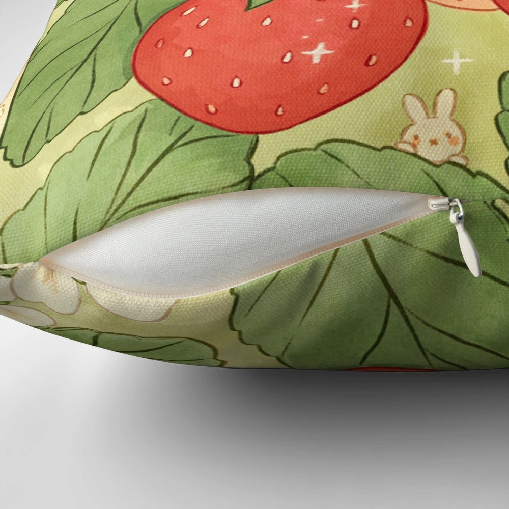 A soft, plush pillow featuring a delicate pattern of strawberries, daisies, and clovers for a charming, nature-inspired bedroom or living space.