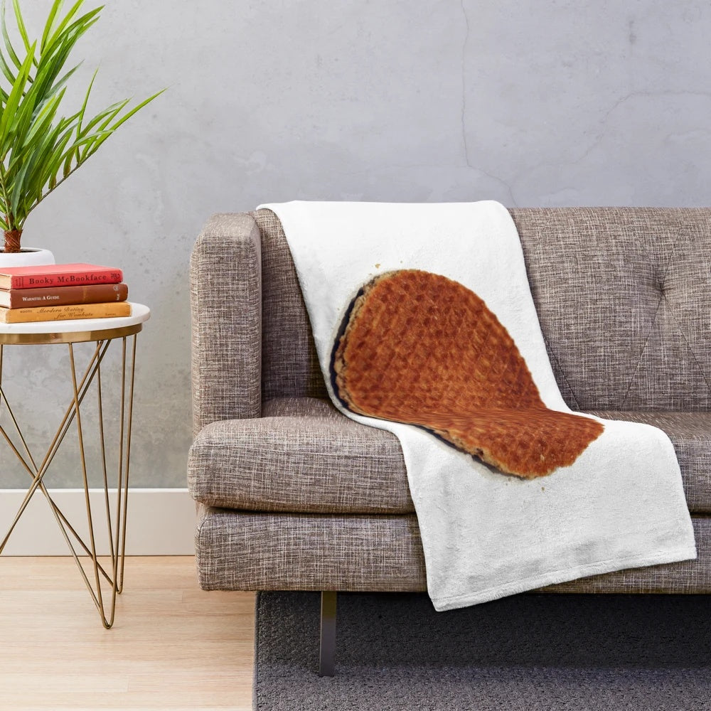 Soft and cuddly plush blanket featuring a stroopwafel design