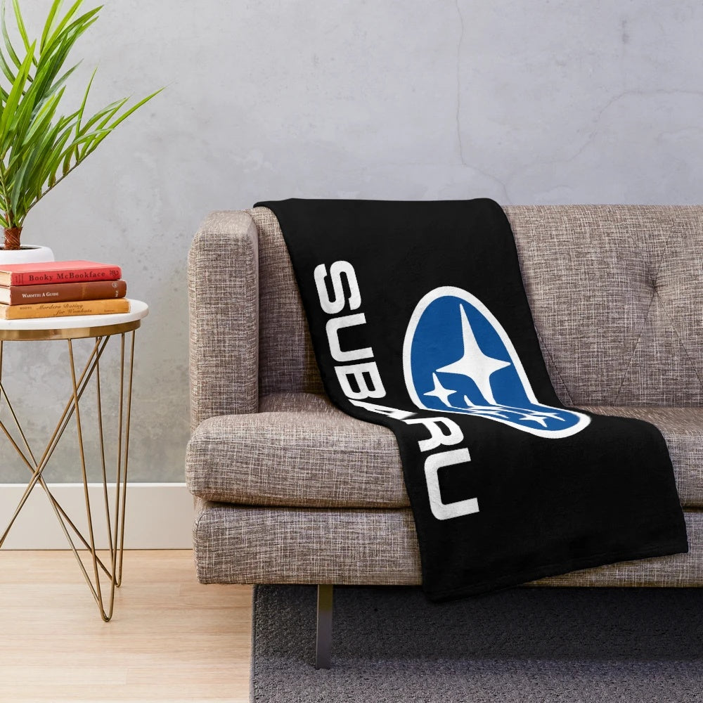 Subaru-inspired plush blanket with logo