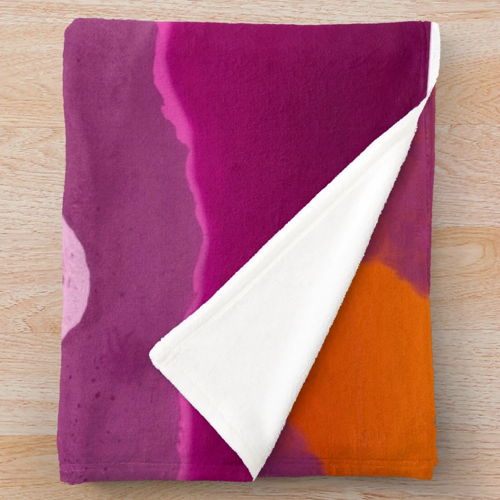 Soft and snug plush blanket with a subtle LGBTQ sunset flag design