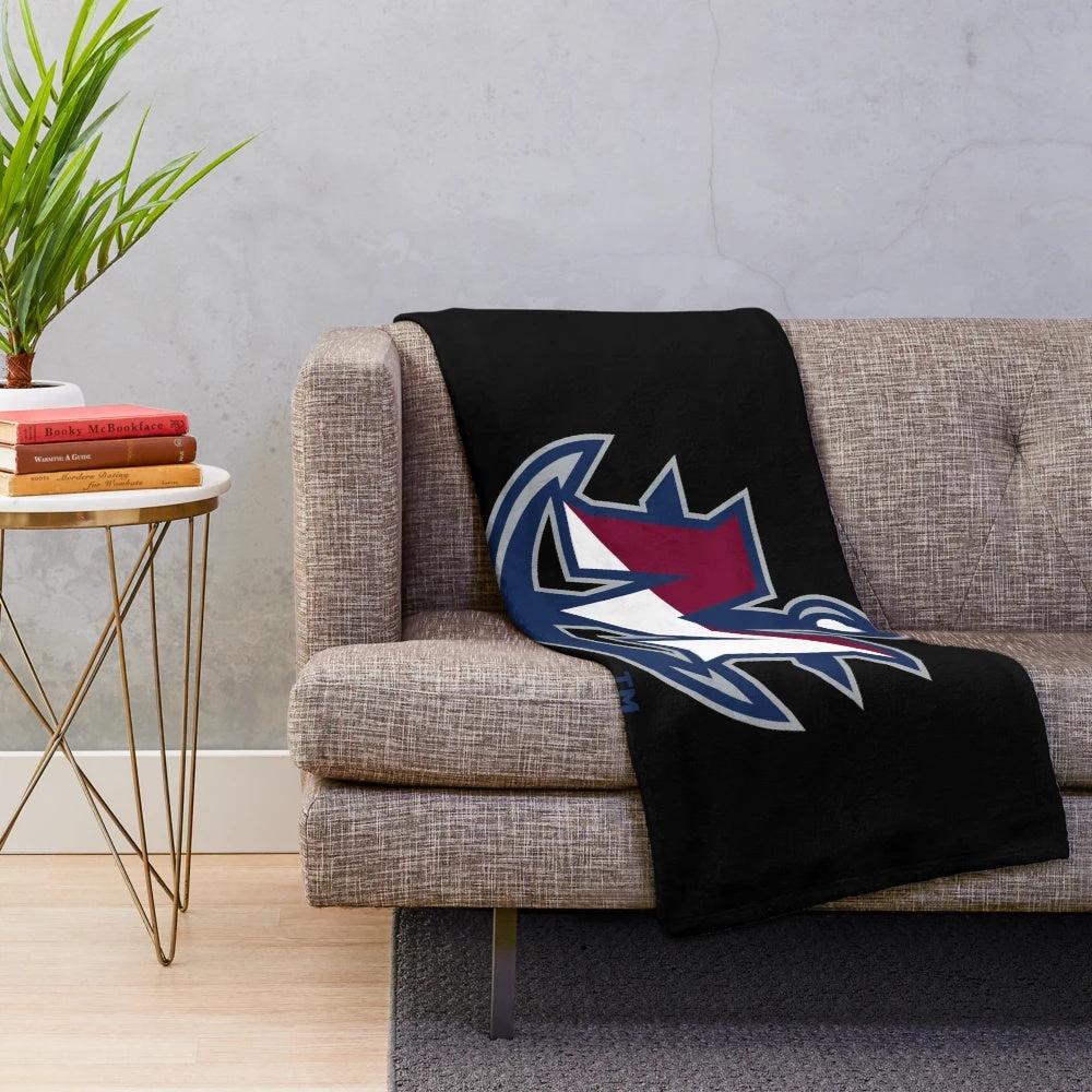 SUNY Maritime-inspired plush blanket with college logo