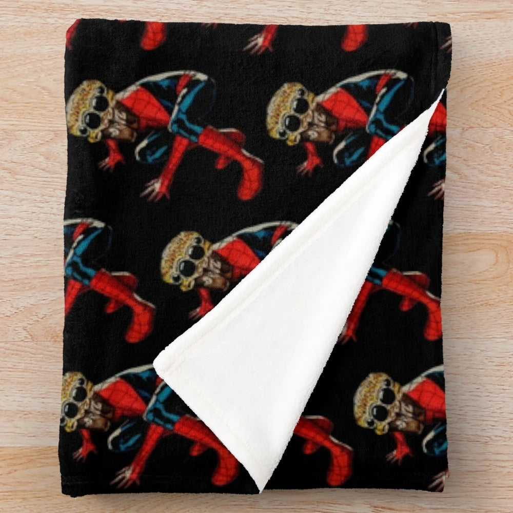 Superhero-inspired plush blanket with spiderweb design