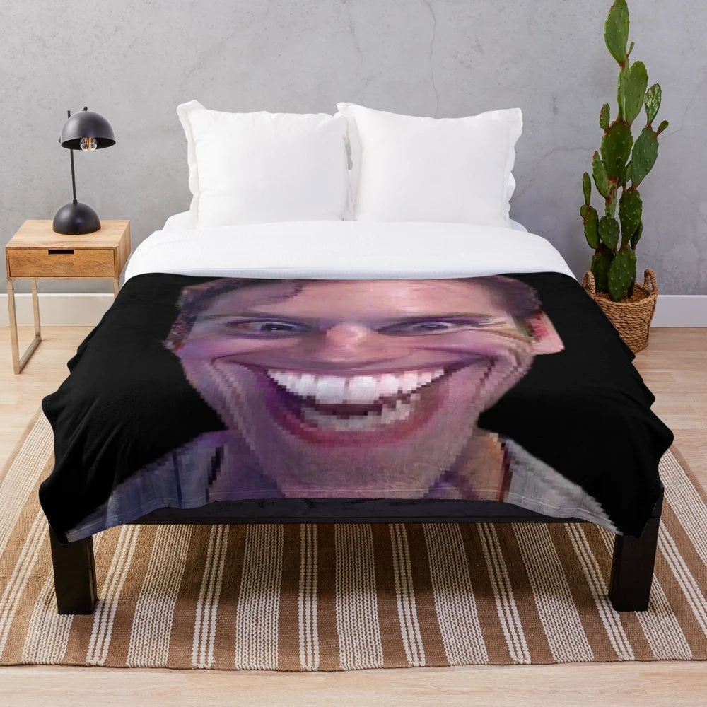 Plush blanket with a "Sus" face, inspired by the Jerma985 meme