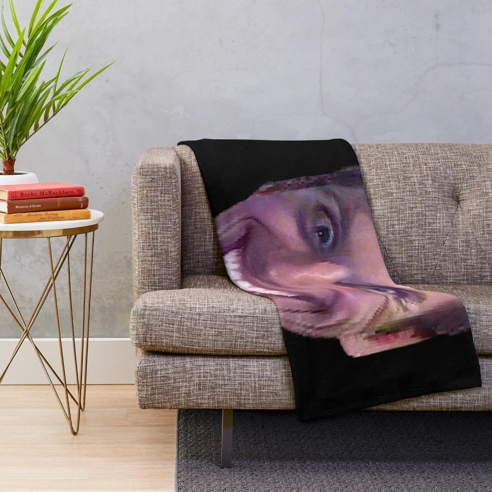 Plush blanket with a "Sus" face, inspired by the Jerma985 meme