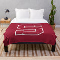 Swarthmore College plush blanket with ice hockey design