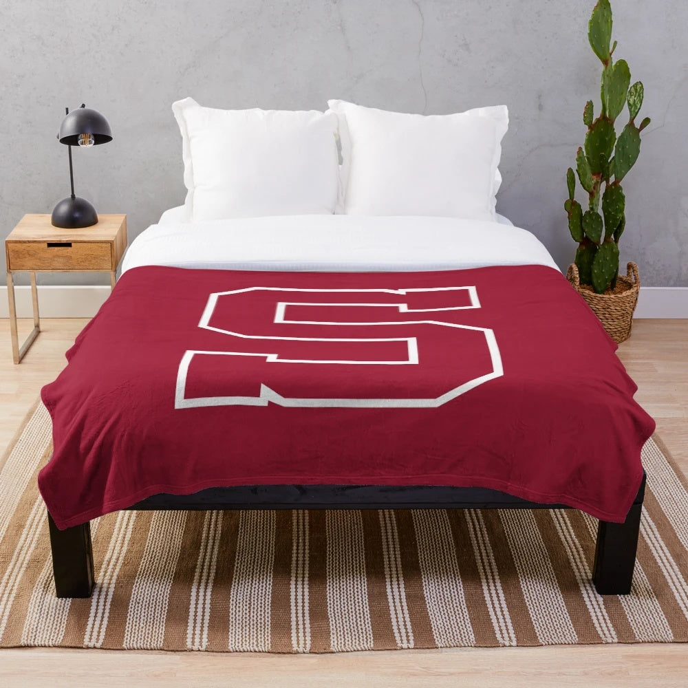 Swarthmore College plush blanket with ice hockey design