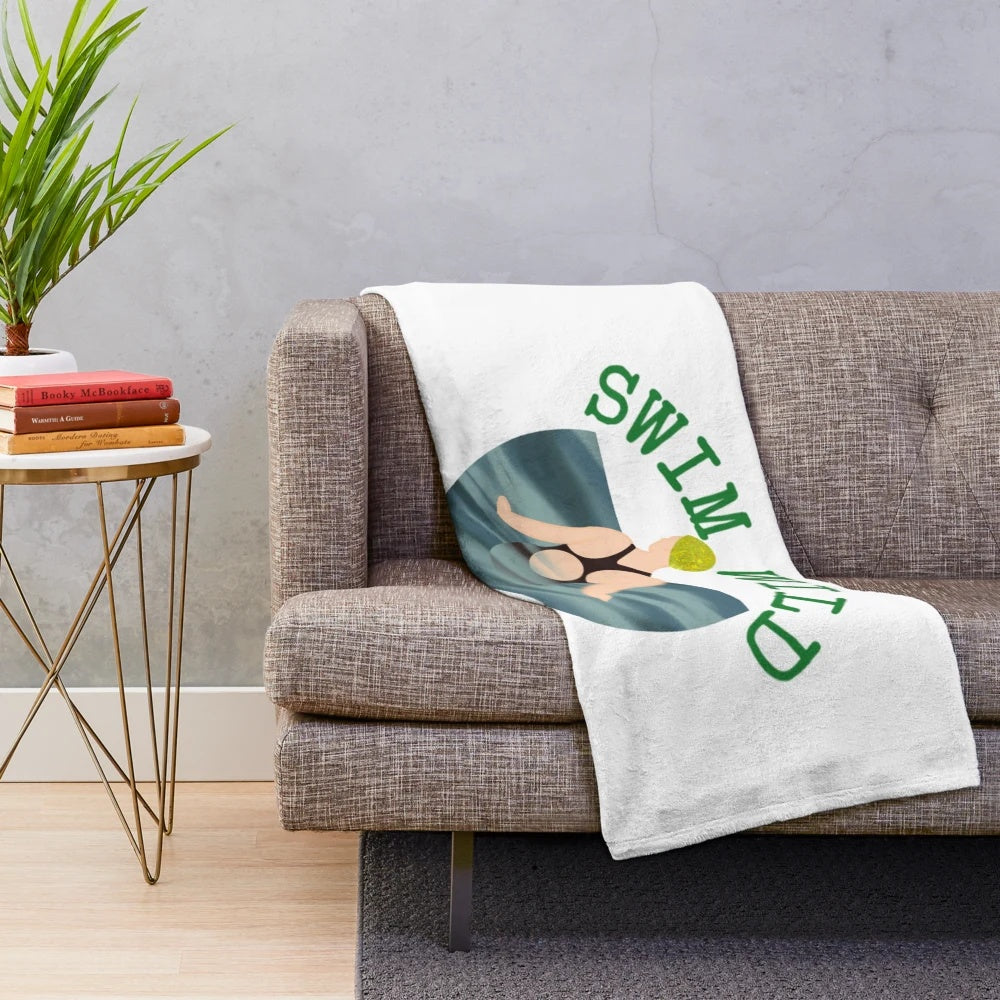 Plush blanket with a nature-inspired 'Swim Wild' design