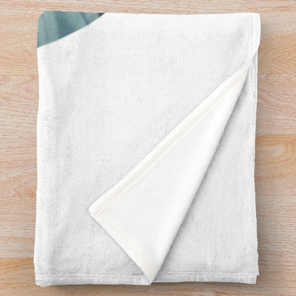 Plush blanket with a nature-inspired 'Swim Wild' design