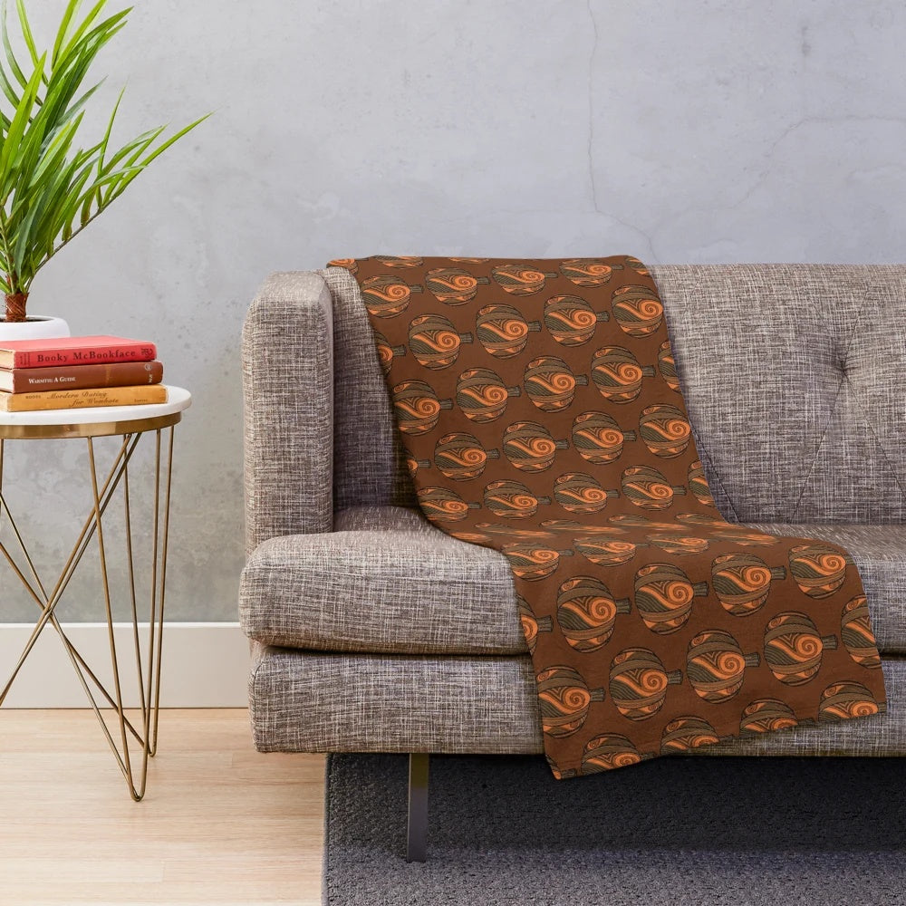 Artsy pumpkin-patterned plush blanket with swirl design