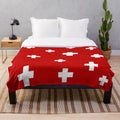 Swiss-inspired plush blanket with minimalist geometric design