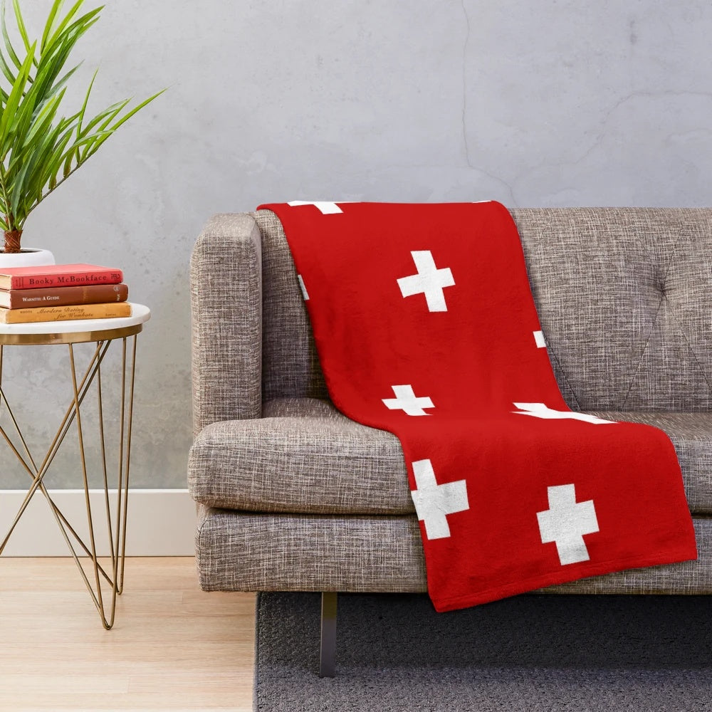 Swiss-inspired plush blanket with minimalist geometric design