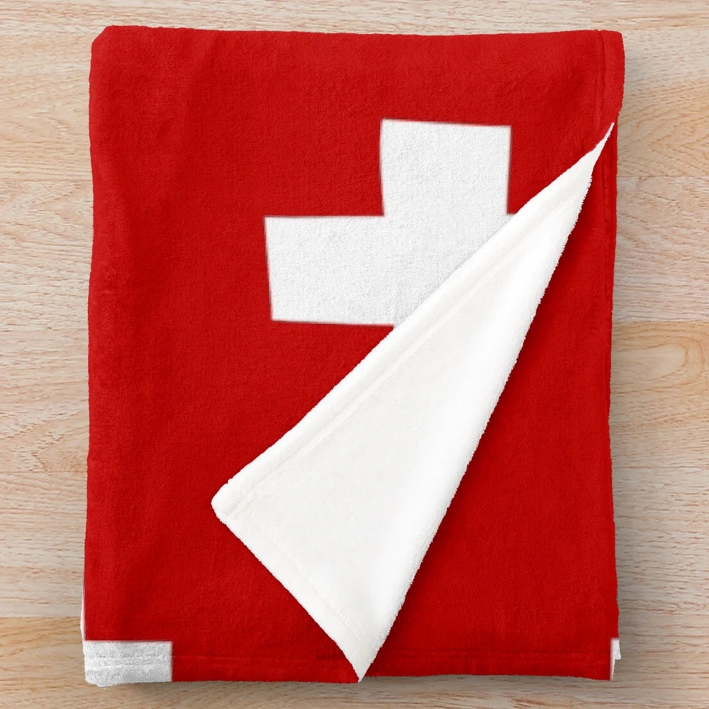 Swiss-inspired plush blanket with minimalist geometric design