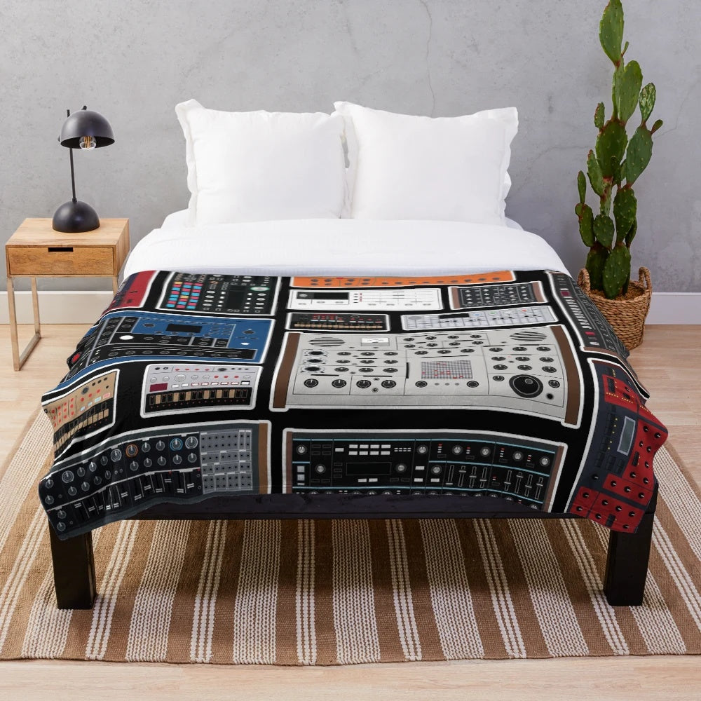 Plush blanket featuring synthesizer and electronic music-inspired design