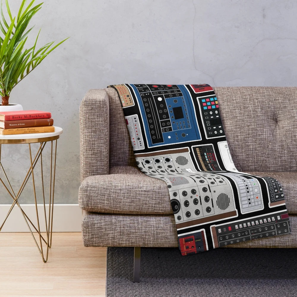 Plush blanket featuring synthesizer and electronic music-inspired design