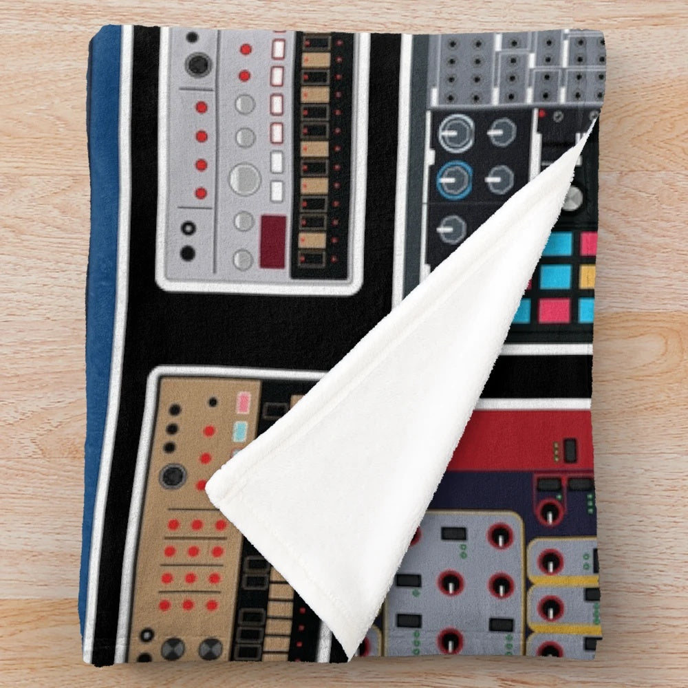 Plush blanket featuring synthesizer and electronic music-inspired design